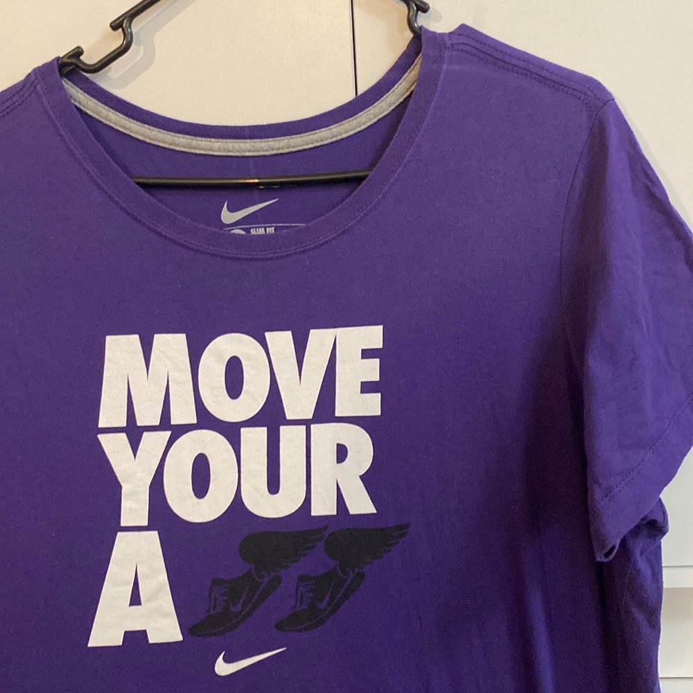 Nike - Purple “Move Your A**” Winged Shoe Tee